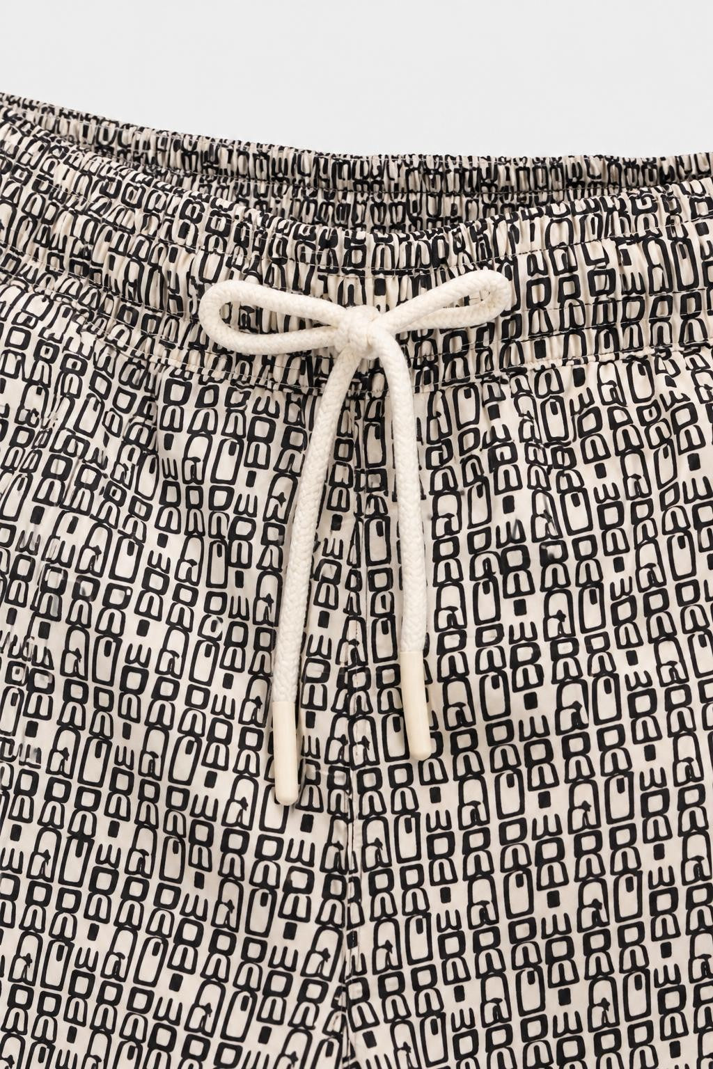 04651/ A Trip in a Bag Microfibre Swim Shorts 'Abstract' Off-White / Black Patterned