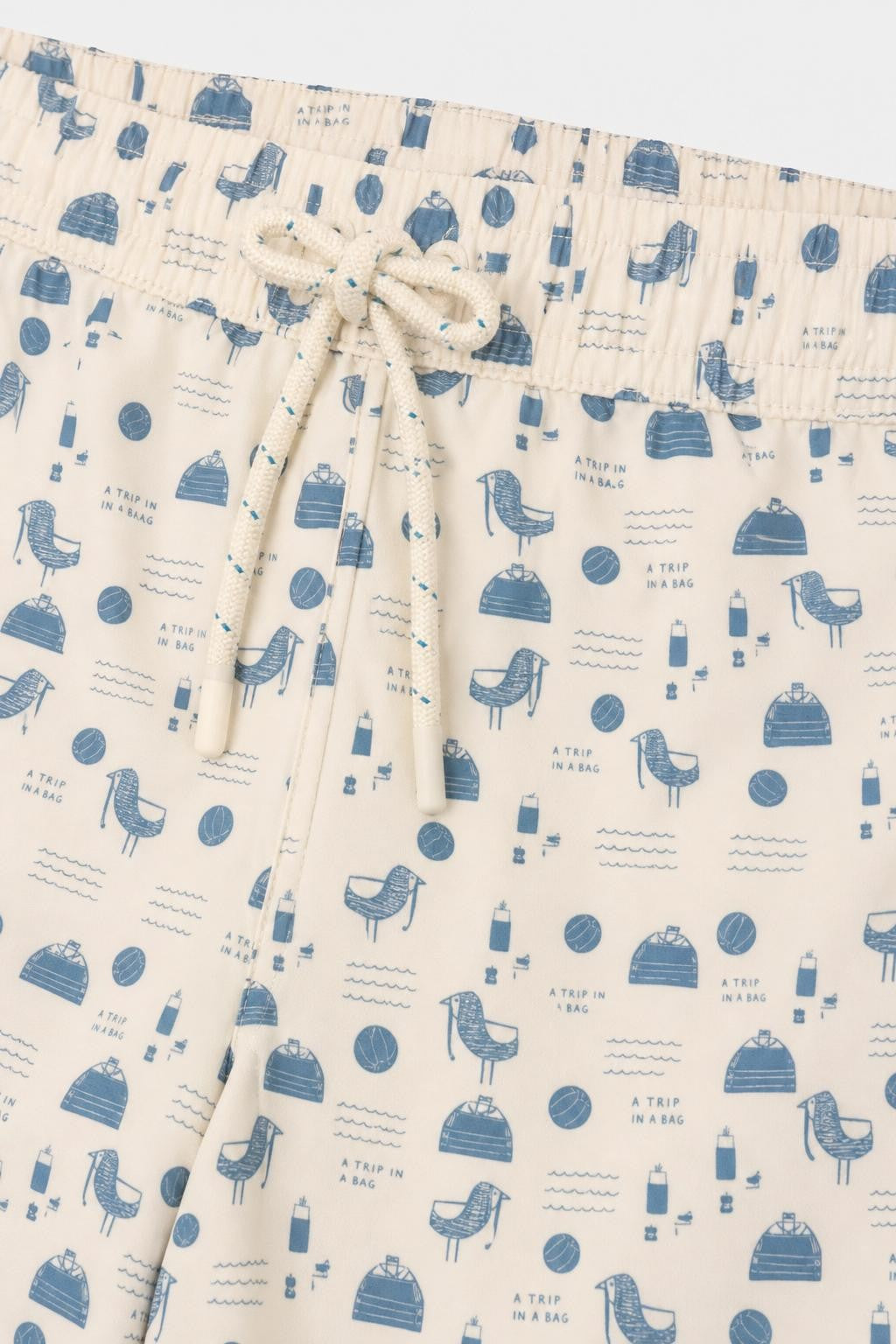 04651/ A Trip in a Bag Microfibre Swim Shorts 'Seaside' Cream / Smoky Blue Patterned